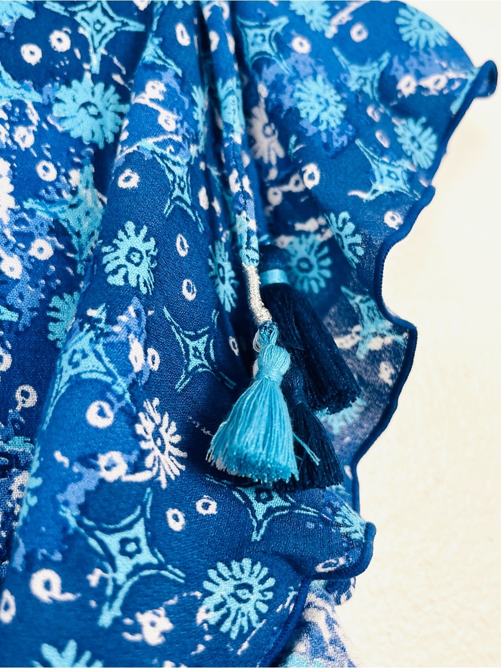 Poupette St Barth Medium Blue Floral Smocked Flutter Sleeve Tasseled Mini Dress - Picture 4 of 7